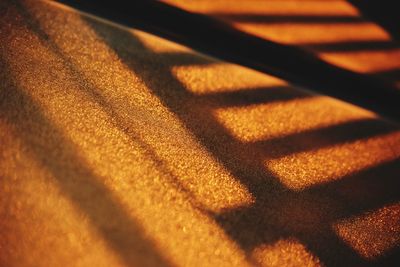 Close-up of sunlight falling on carpet