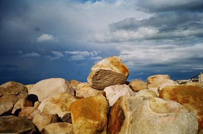 Scenic view of landscape against cloudy sky