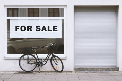 Bicycle parked outside building