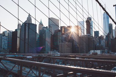 Low angle view of skyscrapers in city against sky