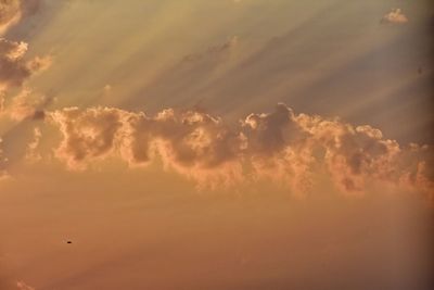 Low angle view of clouds in sky during sunset