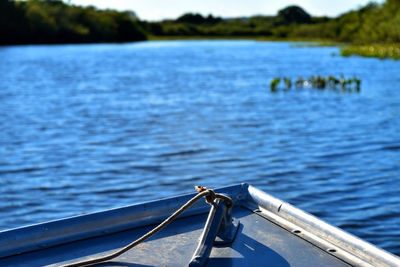 Scenic view of lake against blue sky