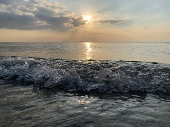 Scenic view of sea against sky during sunset