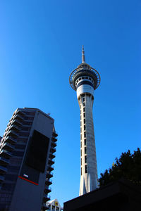 Low angle view of building against blue sky