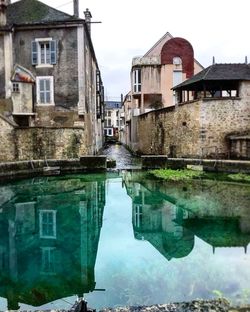 Reflection of buildings in canal