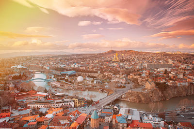 High angle view of townscape against sky during sunset