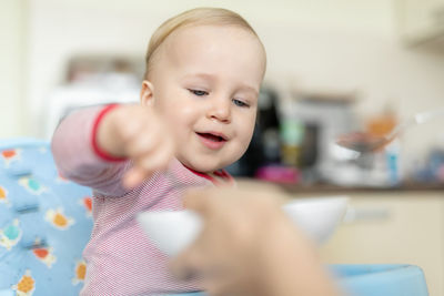 Portrait of cute boy at home