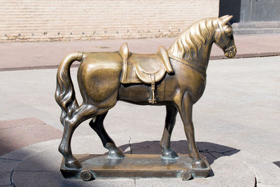 View of horse statue against wall