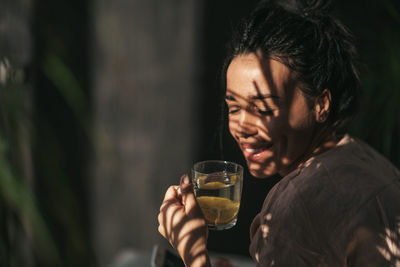 Portrait of man drinking beer glass