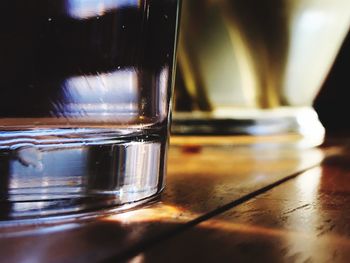 Close-up of beer glass on table