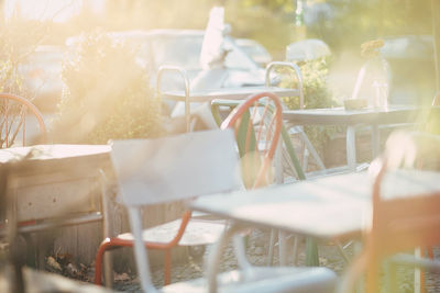 Empty chairs and table in cafe