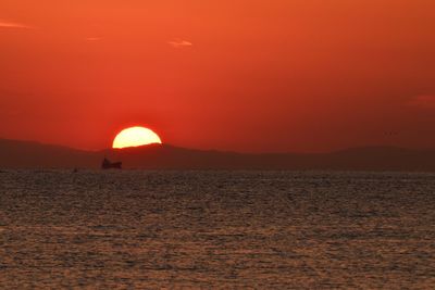 Scenic view of sea at sunset