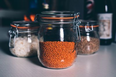 Close-up of glass jar on table