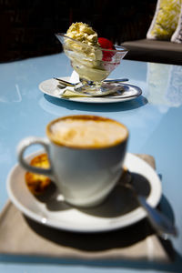 Close-up of coffee cup on table