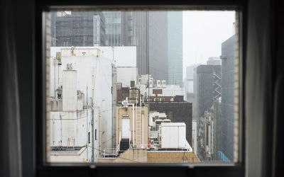 Cityscape seen through window