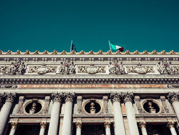 Low angle view of building against blue sky