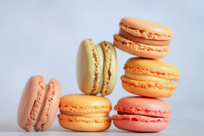 Close-up of macaroons on white background