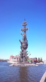 Statue of liberty against blue sky