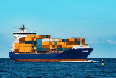 View of ship in sea against sky