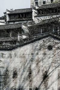 Damaged building against sky