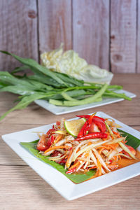 Close-up of salad in plate on table