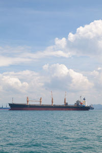 Nautical vessel on sea against sky