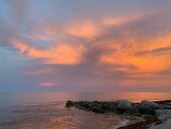 Scenic view of sea against sky during sunset