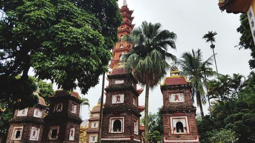 Low angle view of statue against sky