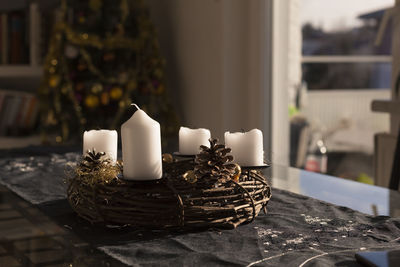 Close-up of candles on table during christmas