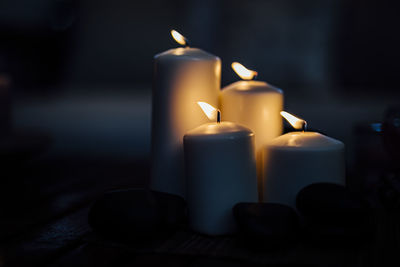 Close-up of candles on table
