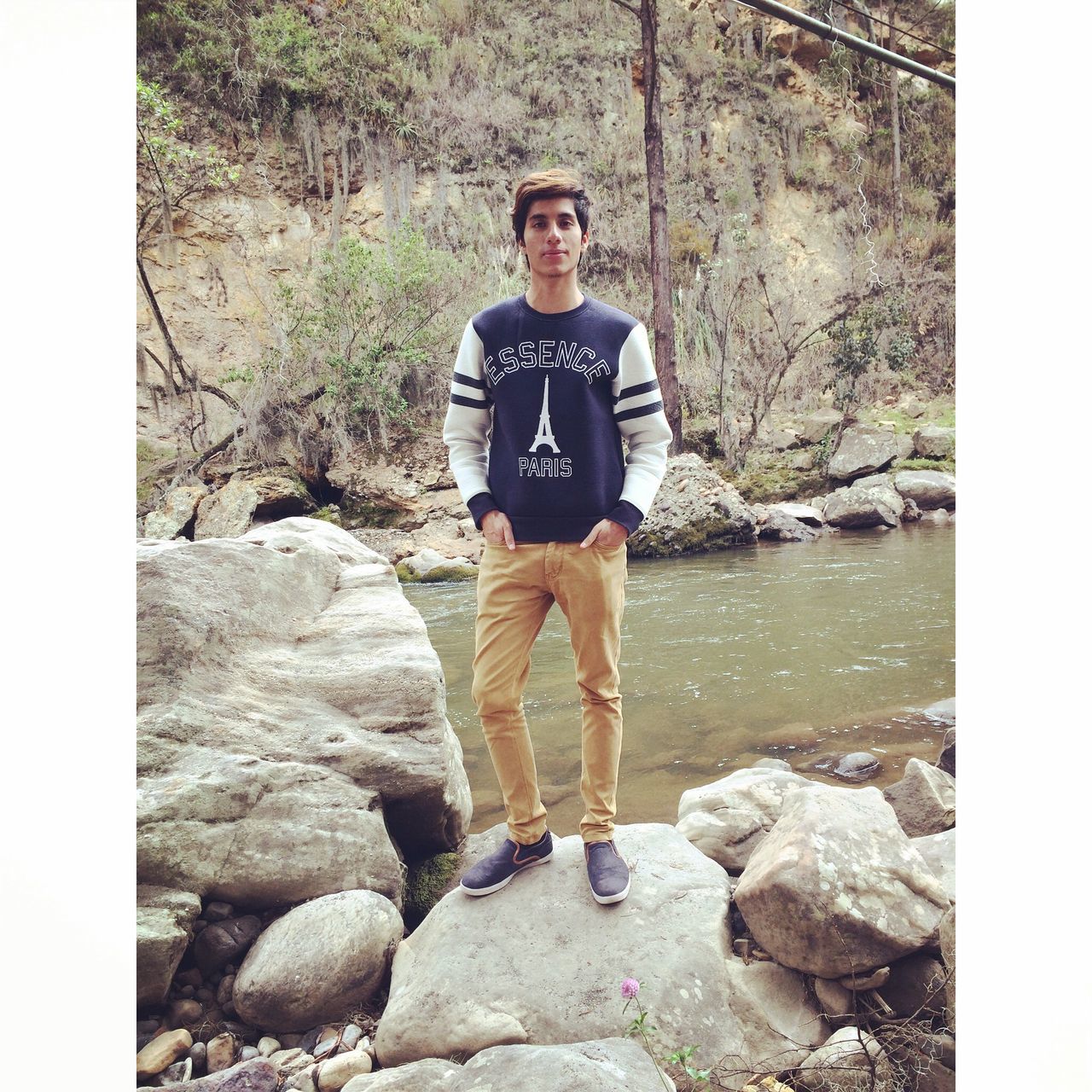lifestyles, rock - object, standing, portrait, transfer print, leisure activity, full length, young adult, looking at camera, casual clothing, front view, person, auto post production filter, rock, young men, forest, water, nature