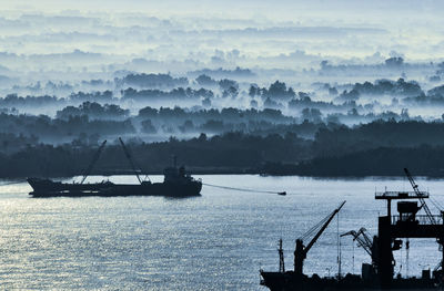Ground fog at saigon river bank, vietnam