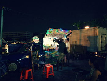 View of market stall at night