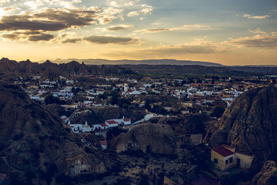 High angle view of townscape against sky at sunset