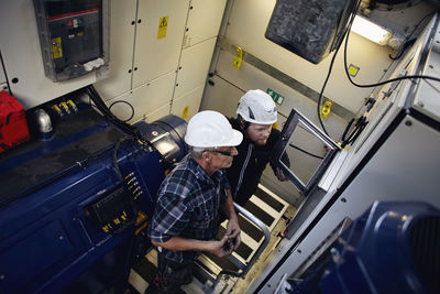 Engineers working in wind turbine