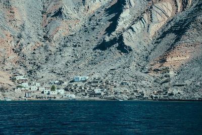 Scenic view of sea against mountain