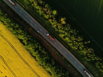 High angle view of railroad tracks by road in city