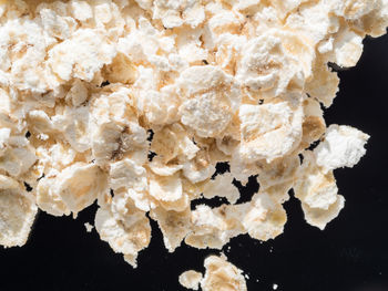 High angle view of white apple against black background