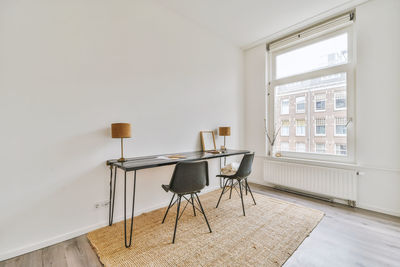 Empty chairs and table at home