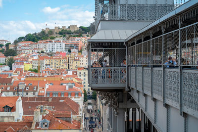 Buildings in city against sky