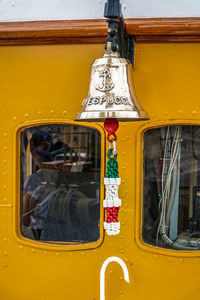 Close-up of yellow motorcycle