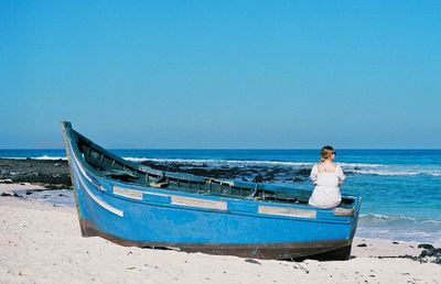 Woman sitting on the boat