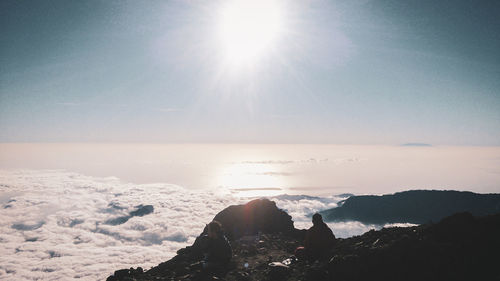 Scenic view of mountain against sky on sunny day