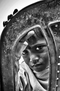 Close-up portrait of boy in sculpture