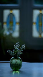 Flower vase on an empty table