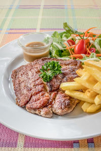 Close-up of meal served in plate on table