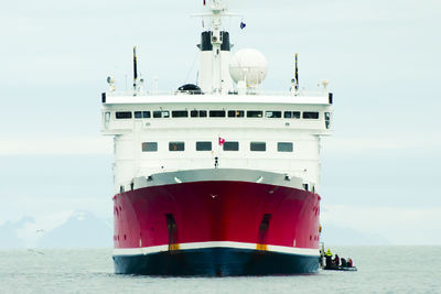 Boat in sea against sky