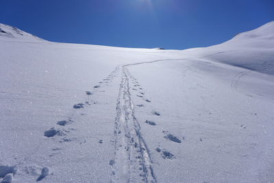 Scenic view of snowcapped mountain against sky