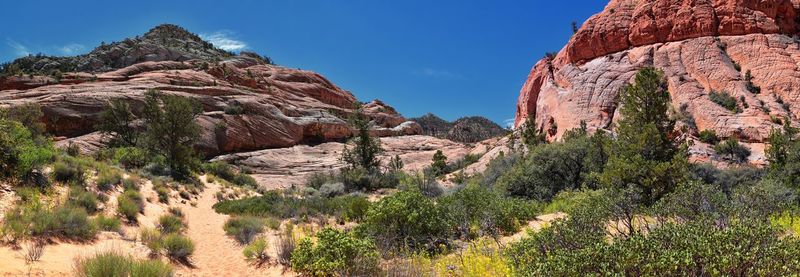 Panoramic view of rock formations against sky