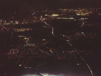 Aerial view of illuminated cityscape